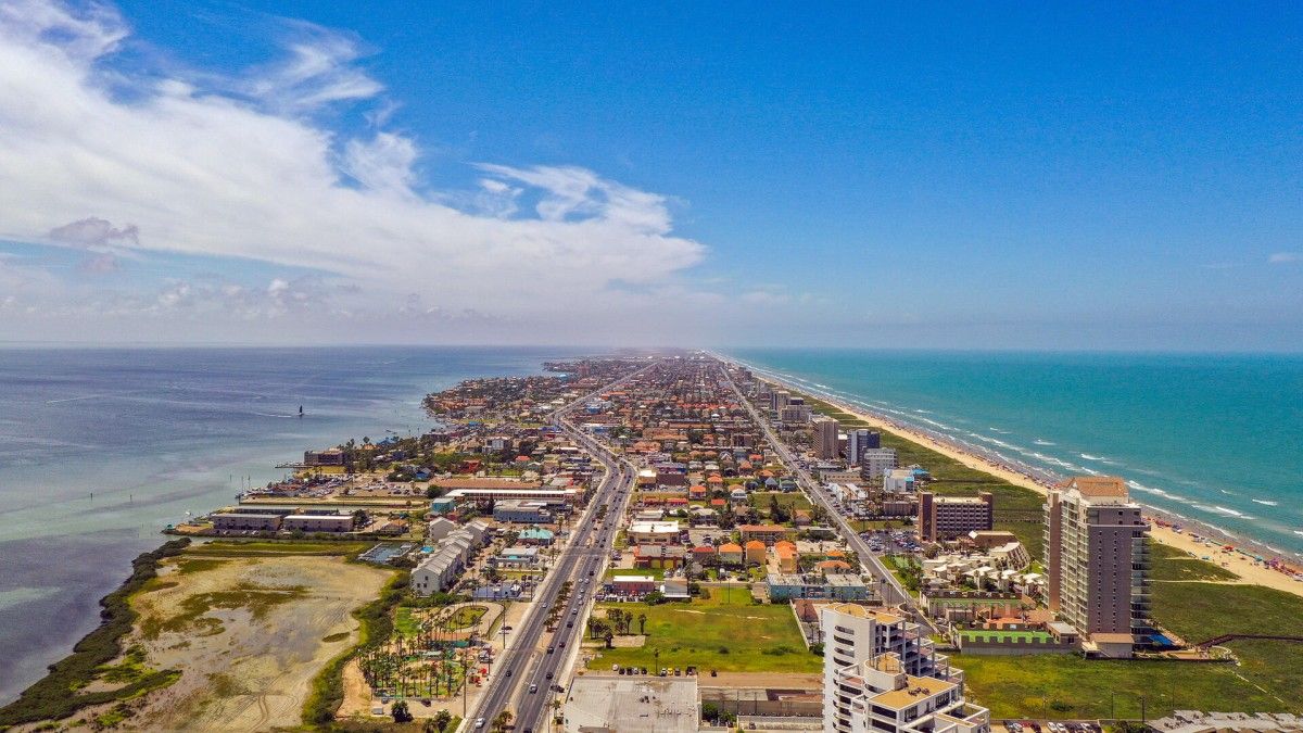 Aerial-drone-shot-of-South-Padre-Island-coastline | South Padre Island Vacation Rentals South Padre Island, Texas
