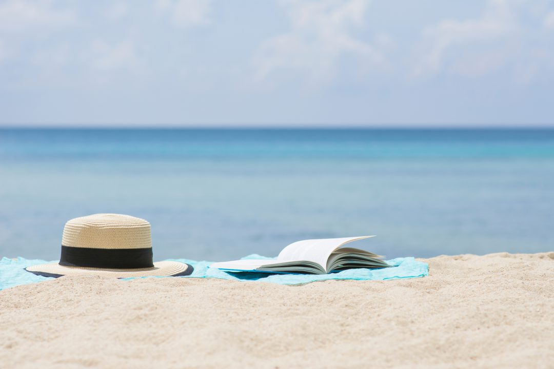 reading-material-beach-essentials-bag | South Padre Island Vacation Rentals Get your Beach Bag Ready for Vacation