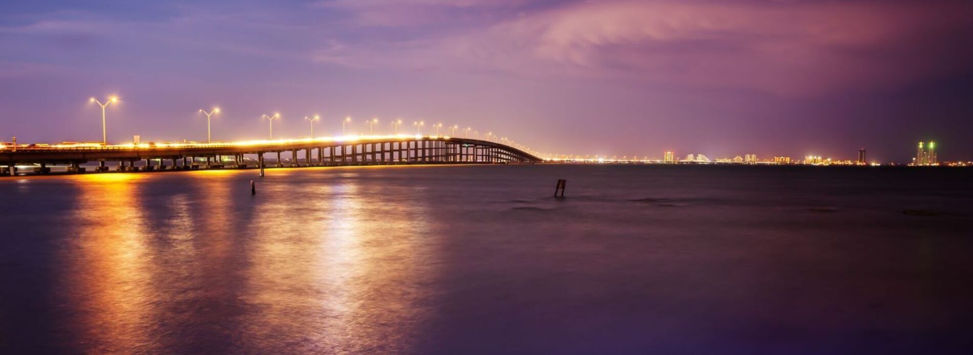 bridge to south padre island at sunset