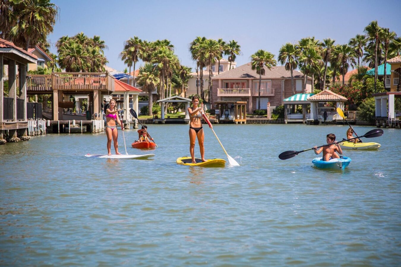 Stand-up-paddleboarding-eco-tours-in-the-bay | South Padre Island Vacation Rentals Paddleboarding on SPI