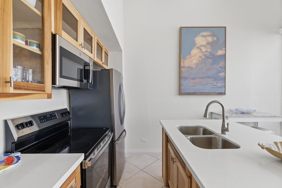 Modern-condo-kitchens-with-stainless-steel-appliances | South Padre Island Vacation Rentals kitchen in south padre island vacation rental